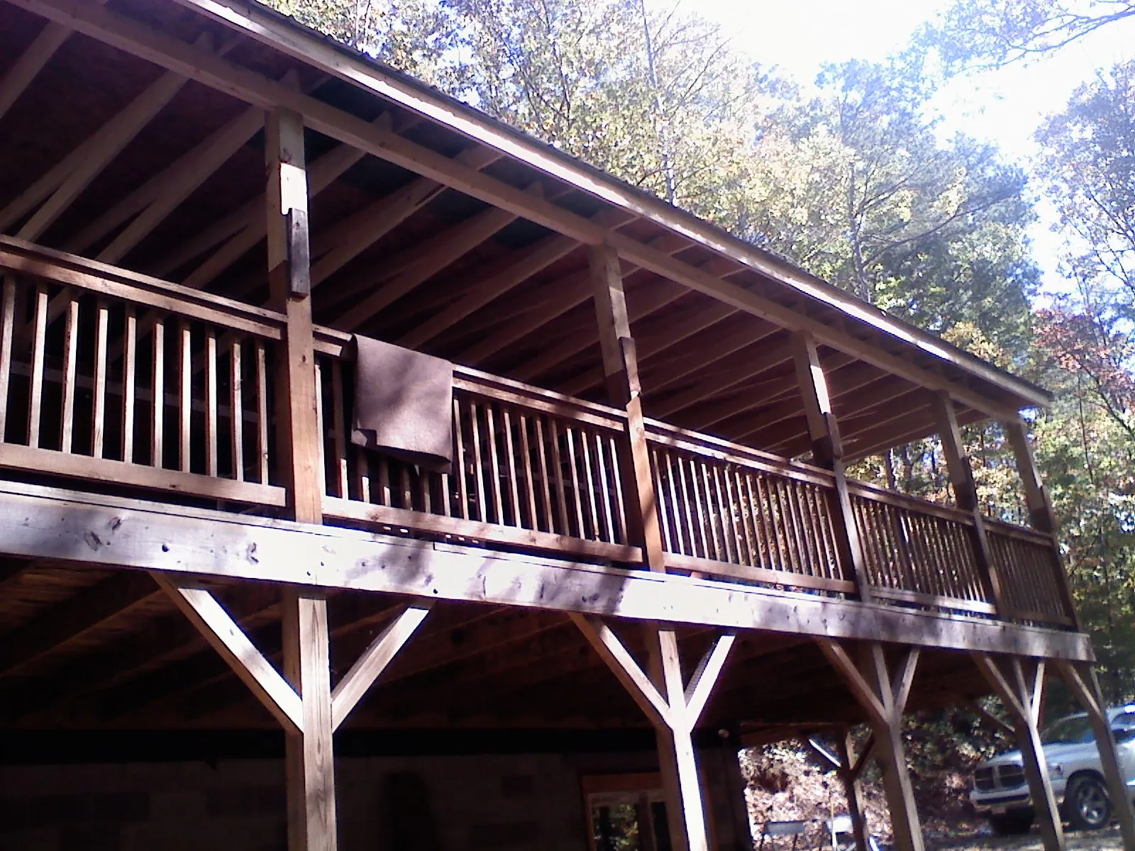 Timber framing under a new elevated porch and deck — Roof Leak Repair in Menomonie by Roofing Brothers